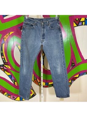 Levi's 501xx, 5 Button Fly, 35x36. Good used condition. Hole in the crotch.